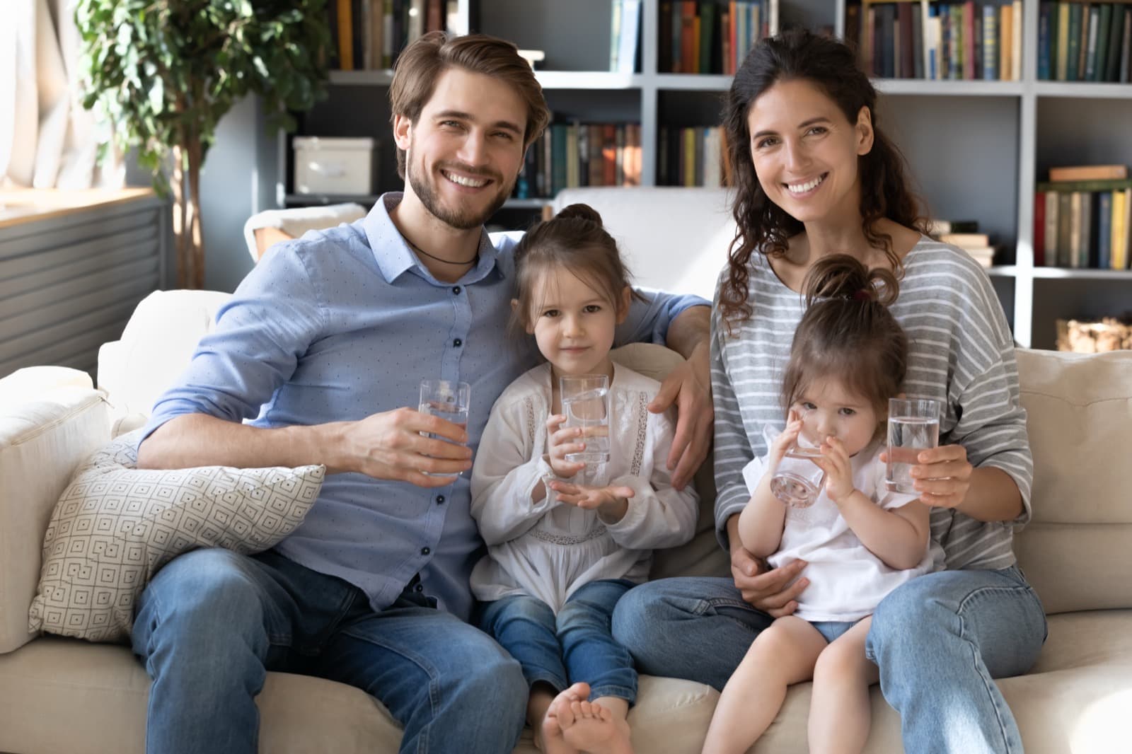 Happy family enjoying clean water
